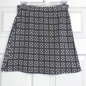 Women’s black and white flower gingham patter skirt. Size medium
